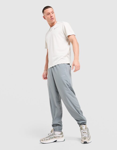 Nike Dri-FIT toelopende multifunctionele herenbroek Form - Grijs- Heren, Grijs